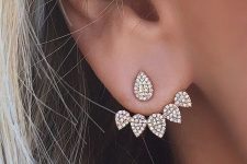 a lovely and elegant drop-shaped ear jacket of gold and rhinestones is romantic and vintage-inspired