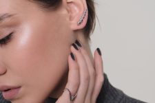 a minimalist silver stud climber earring is a nice accessory for a minimalist look and it will fit many situations