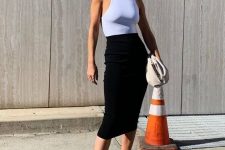 a stylish summer work look with a white halter top, black midi skirt, white square toe heels and a white clutch