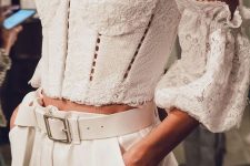 a super romantic outfit with a lace off the shoulder crop top with puff sleeves, high waisted pants