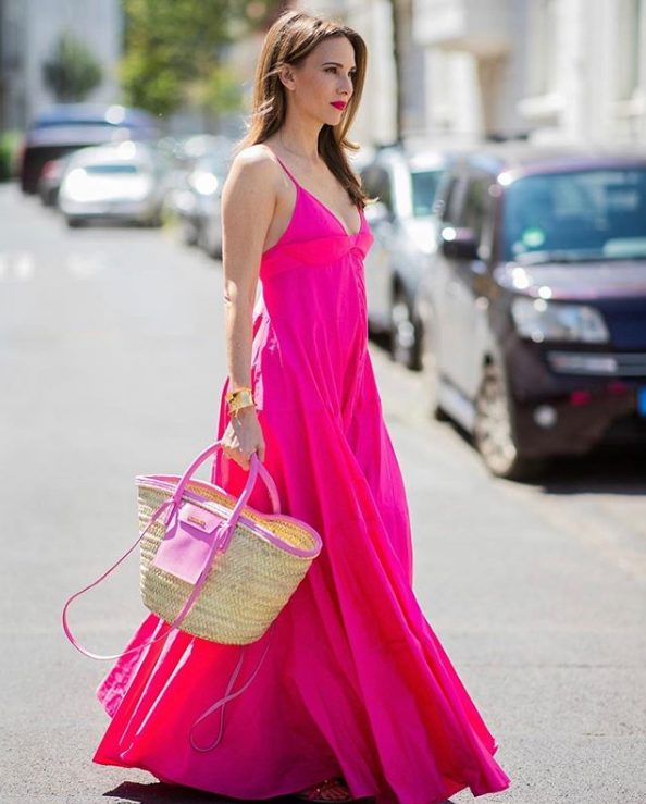 a very special outfit for some occasion done with a hot pink spaghetti strap maxi dress, hot pink sandals and a raffia bag just wows