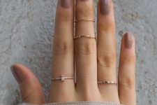 delicate gold and rhinestone rings and two intricate gold midi rings for beautiful accessorizing