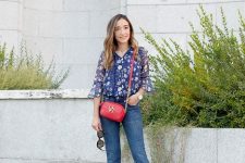 With bell sleeved blouse, red bag and high heels