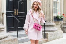 With pale pink coat, black boots and pink crossbody bag