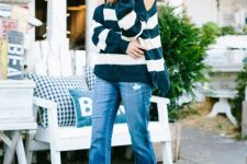 With striped off the shoulder sweater and black ankle boots