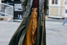 With turtleneck, brown belted midi skirt and suede ankle boots