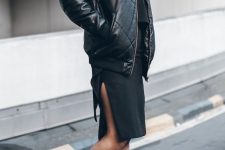 a black top and a knee skirt with a side slit, a black leather jacket and combat boots for the fall