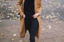 a chic casual look with a black turtleneck, skinnies, sock boots and a camel coat is classics