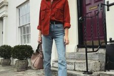 a red chambray shirt, blue raw hem jeans, snakeskin print ankle booties and a dusty pink bag
