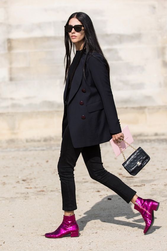 a total black look with a top, an oversized blazer, black skinnies, a small bag and hot pink glitter booties