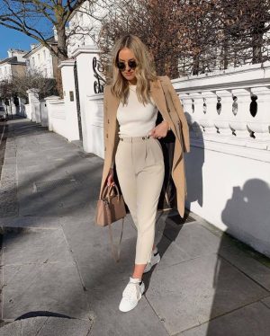 Picture Of an elegant neutral work look with a white bodysuit, creamy ...