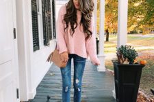 With distressed skinny jeans, brown tassel bag and lace up shoes