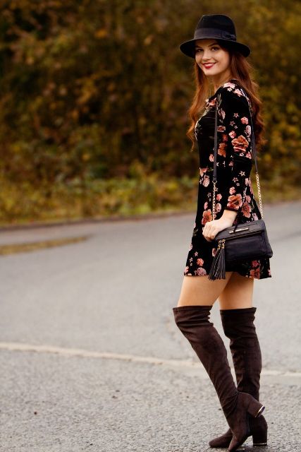 With floral mini dress, tassel bag and hat