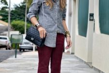 With gray button down shirt, chain strap bag and high heels