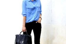 With light blue button down shirt, black skinny pants and black pumps