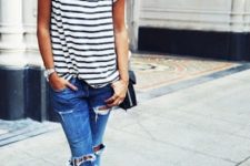 With striped shirt, black bag and black low heeled shoes