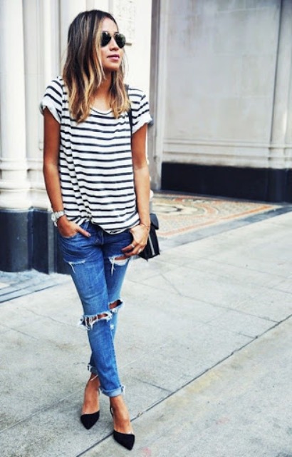 With striped shirt, black bag and black low heeled shoes