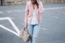 With white blouse, distressed jeans, gray bag and beige cutout boots