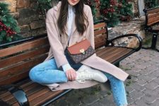 With white shirt, coat, cropped jeans, printed bag and white boots