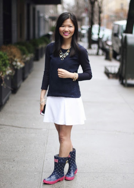 With white skirt and navy blue shirt