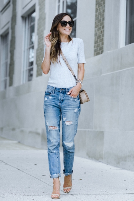 With white t-shirt, shoes and beige crossbody bag