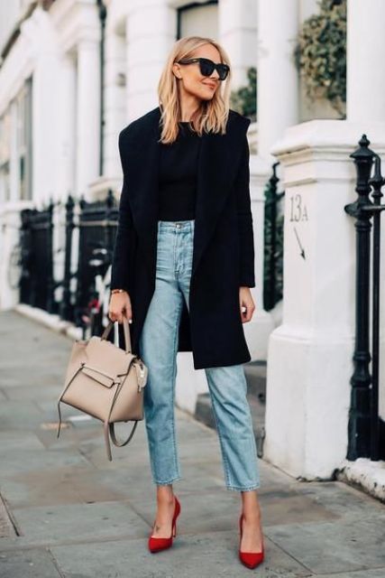 a black top, blue high waisted jeans, red shoes, a black coat and a nude bag to rock this fall