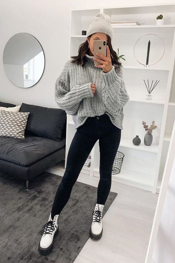 a grey chunky knit oversized sweater, black skinnies, white combat boots and a grey beanie
