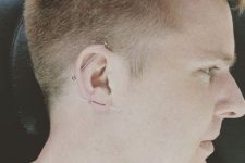 an industrial and double lobe piercing for a very bold and daring look