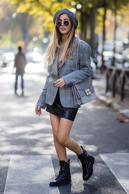 With beige turtleneck, beret, checked blazer, chain strap bag and leather mini skirt