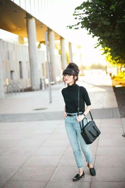 With cropped jeans, black leather bag and black flat shoes