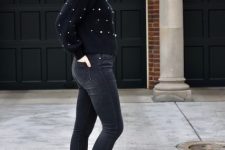With embellished sweater and dark gray jeans