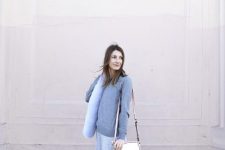 With light blue sweater, faux fur scarf, white bag and white flat shoes