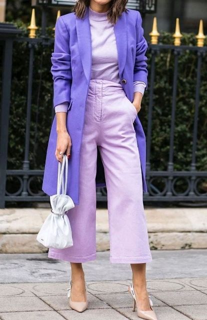 With lilac coat, shirt, white bag and beige high heels