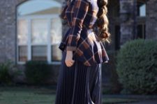 With navy blue pleated skirt and brown shoes