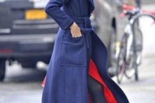 With red dress and navy blue maxi coat