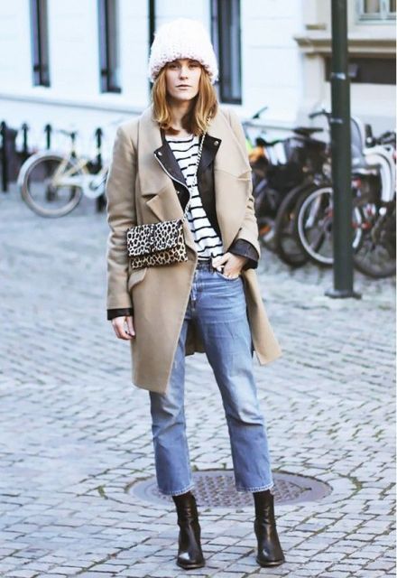 With white hat, beige coat, cropped jeans, striped shirt and black ankle boots