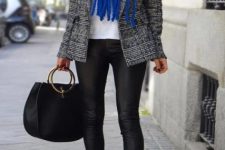 With white shirt, tweed blazer, bag, leggings and blue pumps