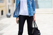 With white t-shirt, denim jacket, leather pants and tote bag