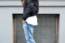 With white t-shirt, puffer jacket and loose jeans