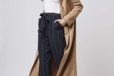 With white turtleneck, white sneakers and beige maxi coat