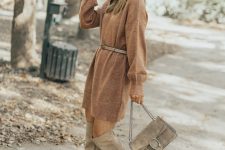 a brown short sweater dress, a grey belt, grey knee boots and a grey bag for fall or winter