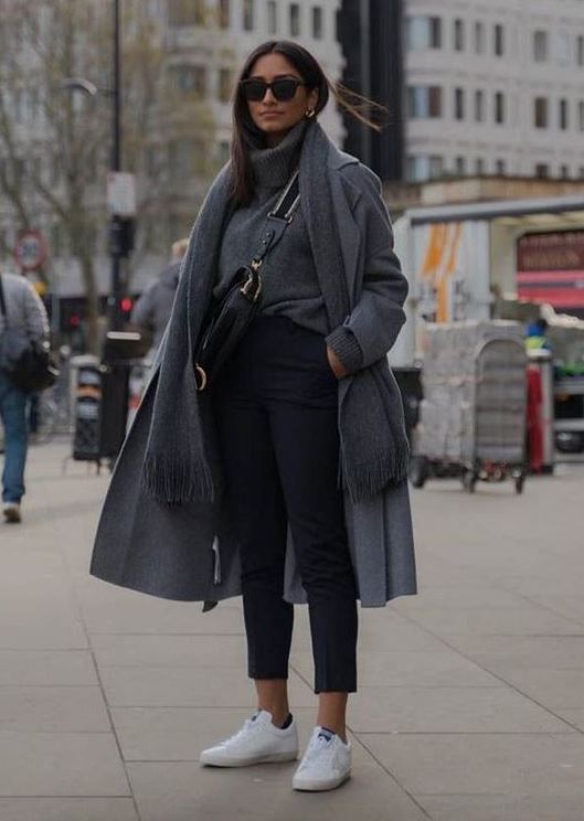 a grey sweater, coat and scarf, black pants, white sneakers and a black bag for an everyday look