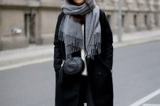 a white sweater, black skinnies, a black knee coat and a bag plus a grey scarf for a comfy look