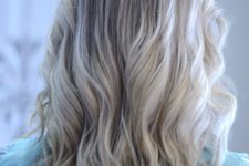 blonde air touch highlights on wavy hair are a very romantic and girlish idea to go for