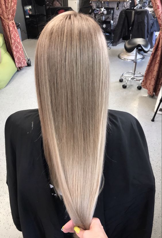 blonde airtouch highlights all over the hair create an absolutely natural look with a modern feel