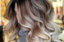burgundy and chestnut hair with blonde airtouch highlights is a very chic and beautiful idea to go for