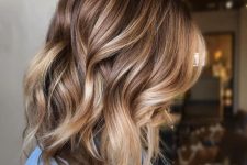 chestnut hair with blonde airtouch highlights and waves is beautiful and very stylish idea