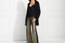 With black fringe top and metallic flare trousers