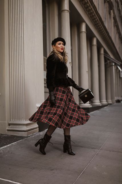 With black fur belted jacket, plaid midi skirt, black mini bag and beret