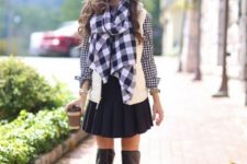 With checked shirt, black pleated skirt, checked scarf and black leather over the knee boots